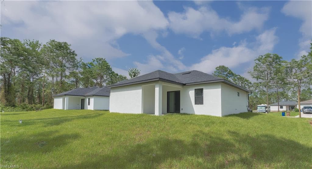 932 Maddock St E, Lehigh Acres, FL 33974-3