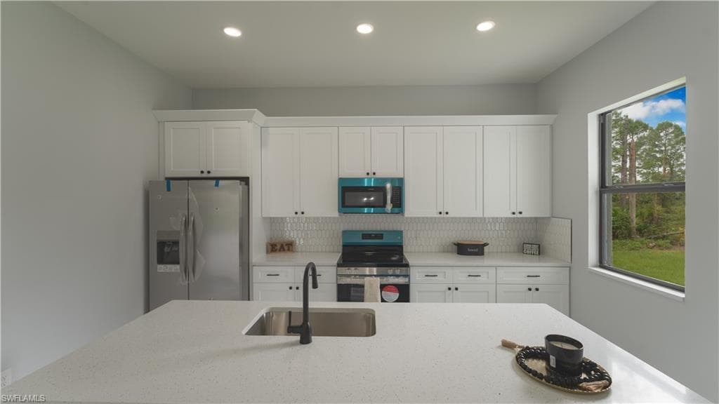 932 Maddock St E, Lehigh Acres, FL 33974-5