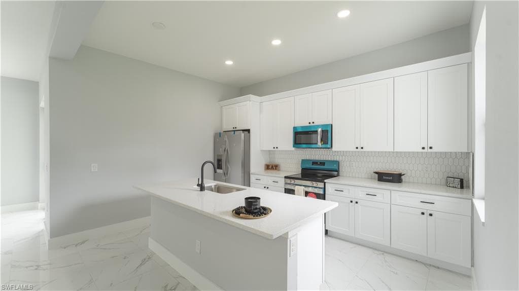 932 Maddock St E, Lehigh Acres, FL 33974-6