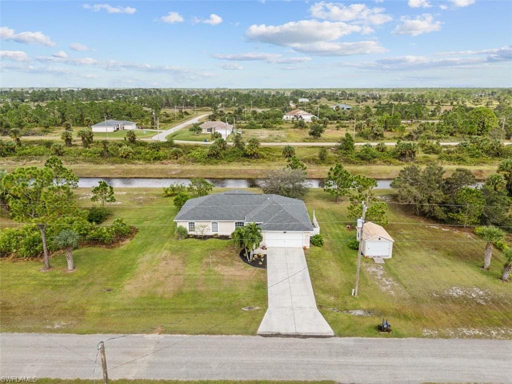 943 Plantation Rd, Lehigh Acres, FL 33974-9