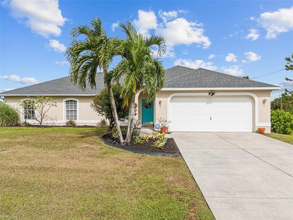 943 Plantation Rd, Lehigh Acres, FL 33974-2