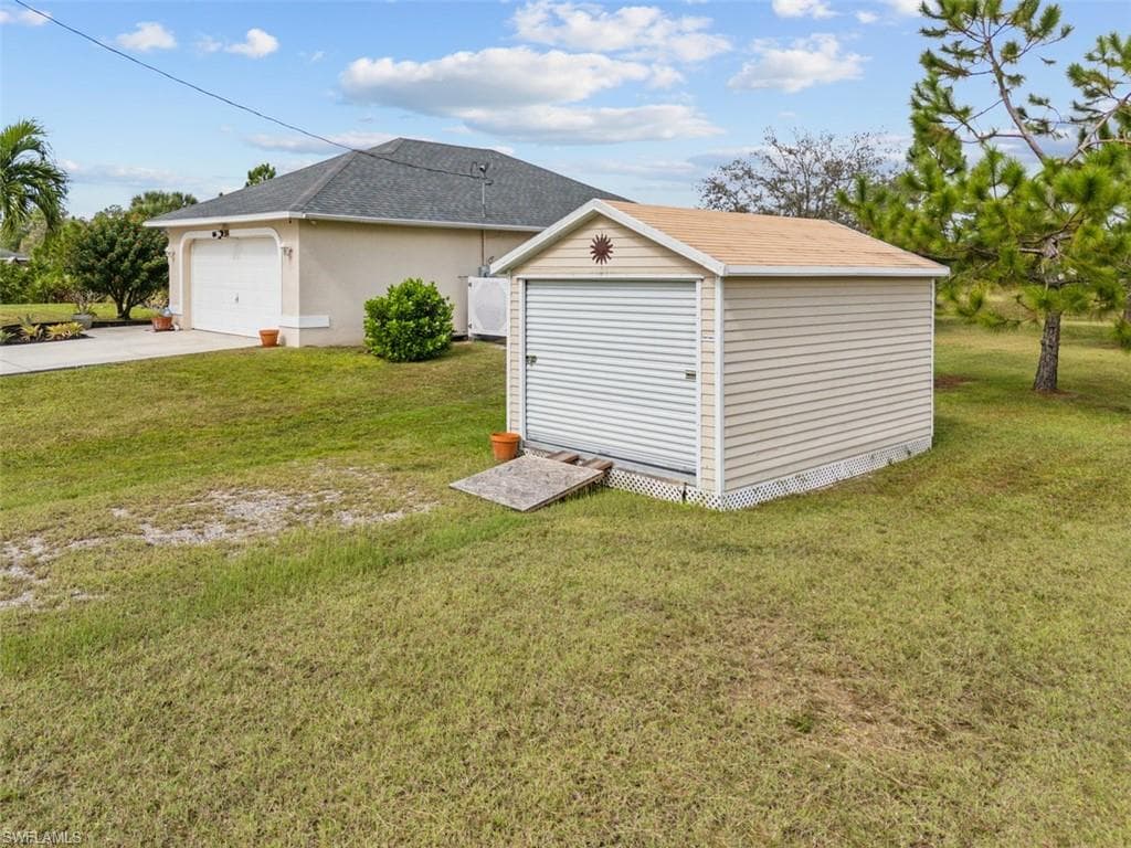 943 Plantation Rd, Lehigh Acres, FL 33974-7