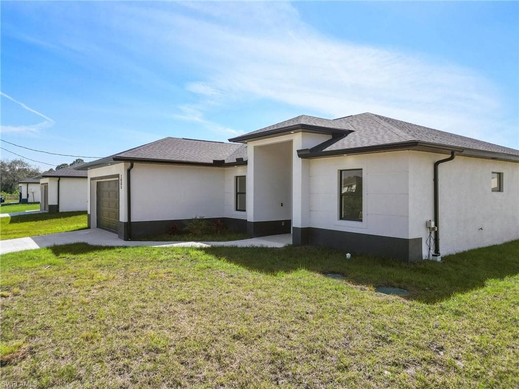 2005 Curry Ave N, Lehigh Acres, FL 33971-3
