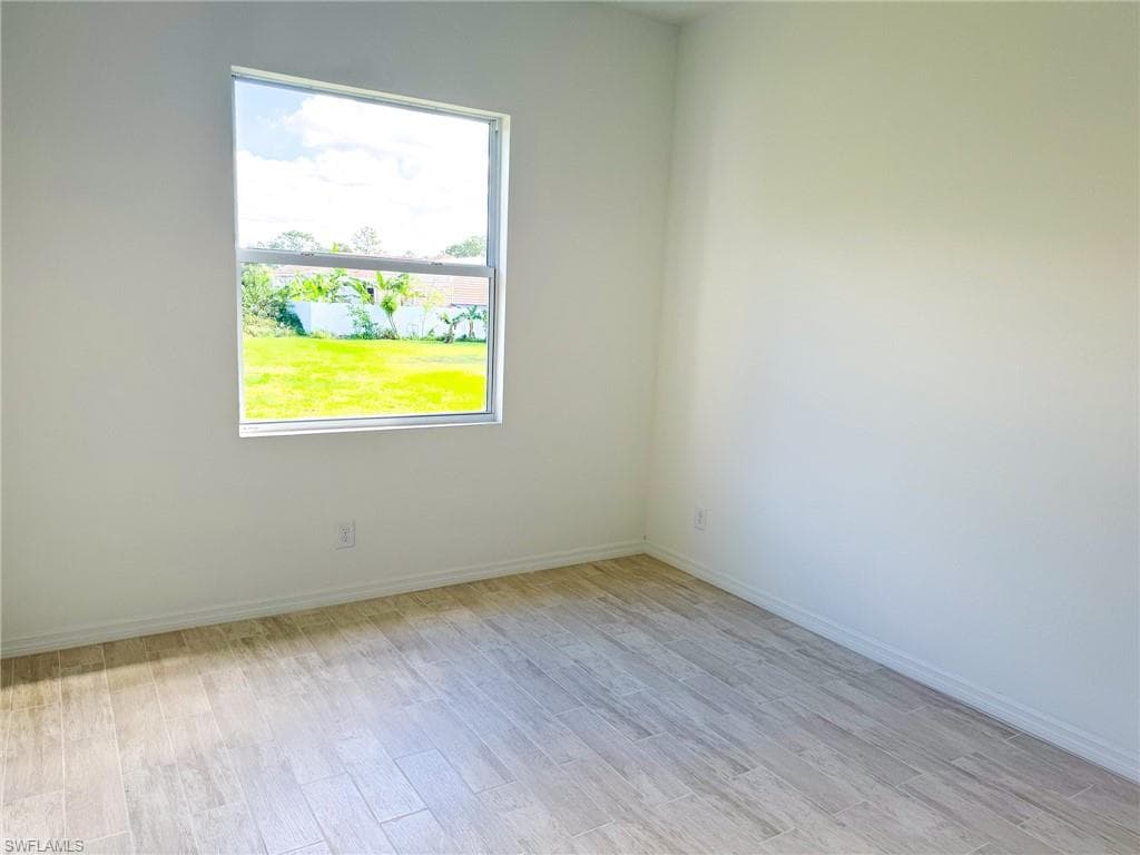 1018 Maddock St E, Lehigh Acres, FL 33974-13