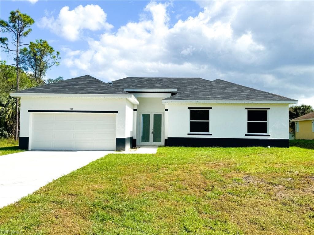 1018 Maddock St E, Lehigh Acres, FL 33974-2