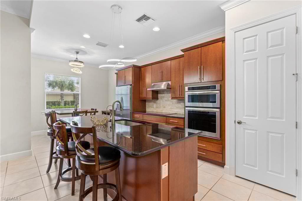 9328 Fieldstone Ln, Naples, FL 34120-9