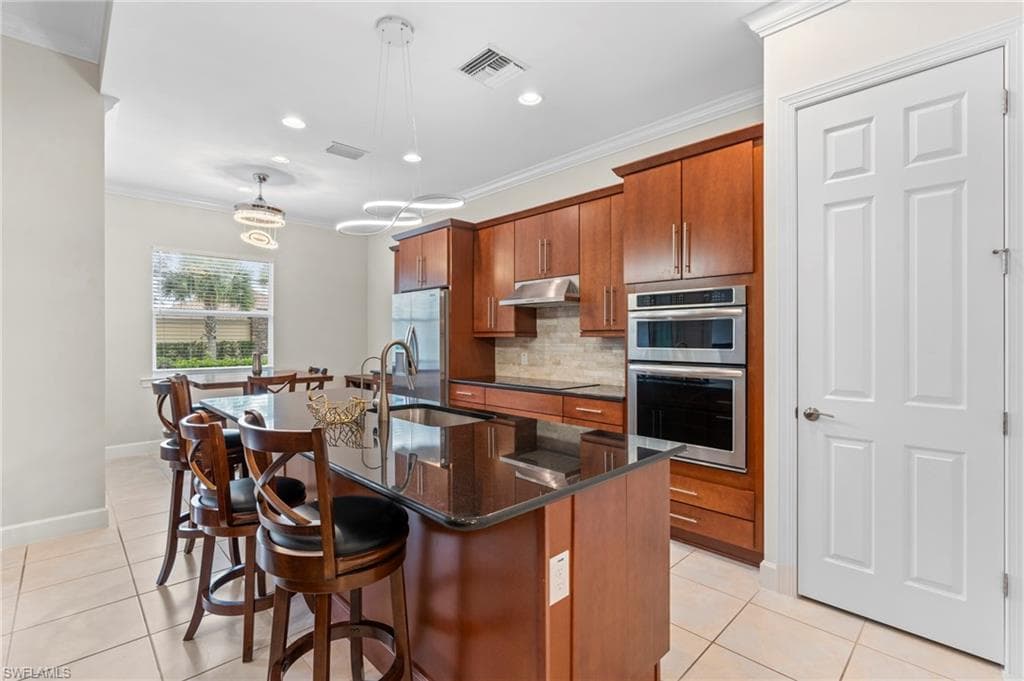 9328 Fieldstone Ln, Naples, FL 34120-22