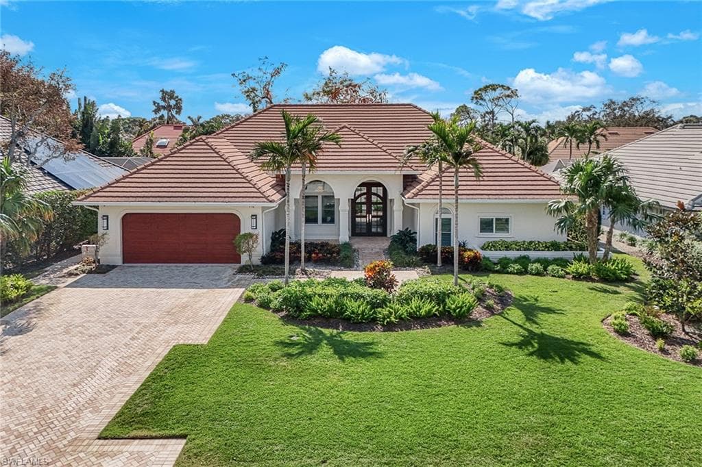 716 Shadow Lake Ln, Naples, FL 34108-2