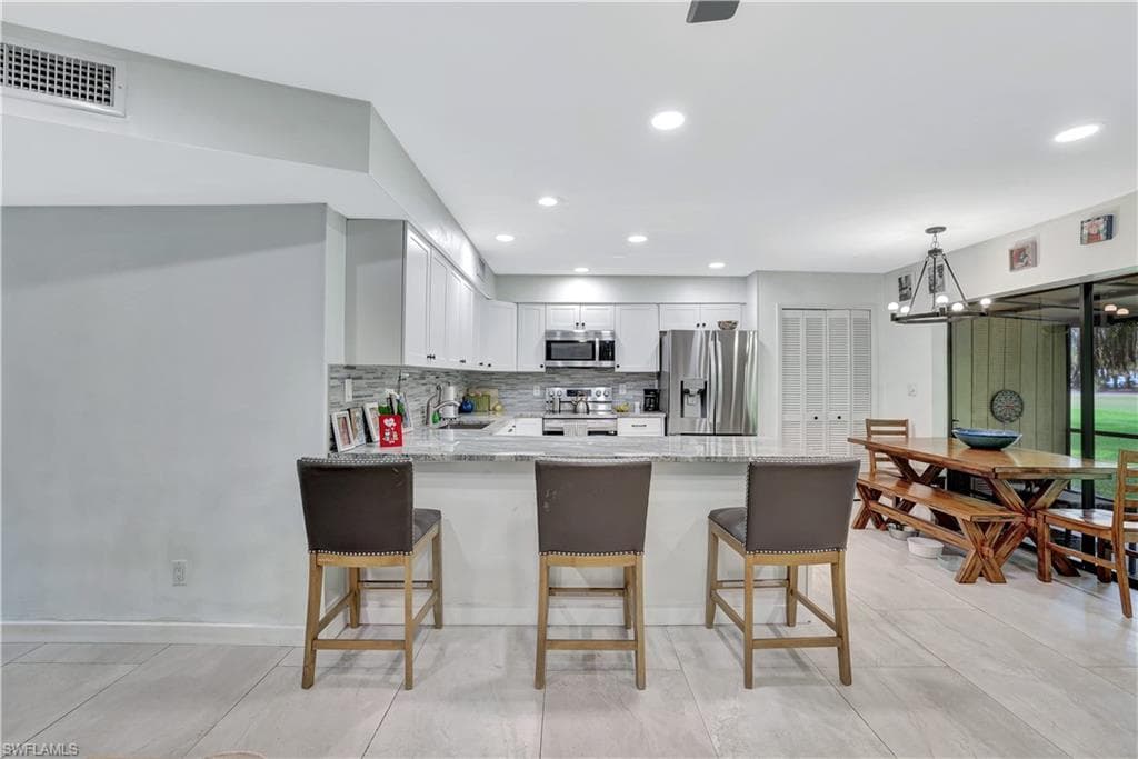 127 Forest Lakes Blvd, Naples, FL 34105-5