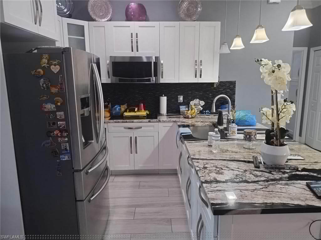 760 12th St NE, Naples, FL 34120-22