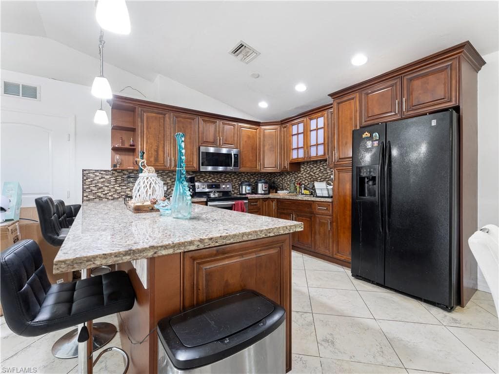 760 12th St NE, Naples, FL 34120-35