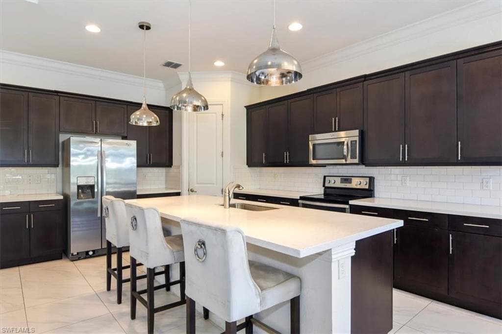 9236 Woodhurst Dr, Naples, FL 34120-3