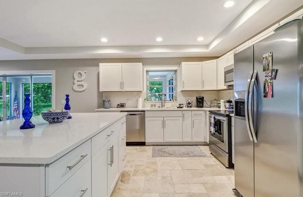 687 Cypress Way E, Naples, FL 34110-3