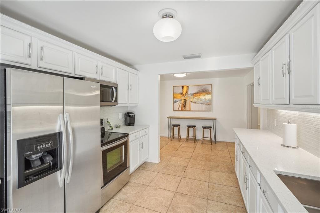 702 107th Ave N, Naples, FL 34108-11