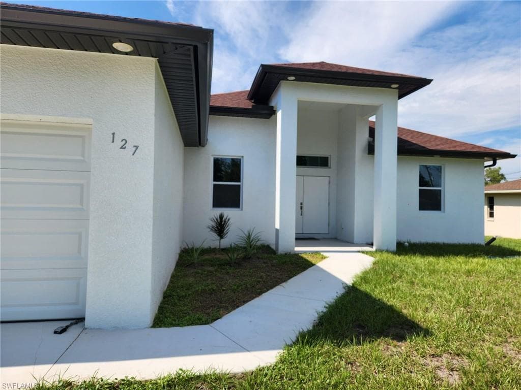 127 Connecticut Rd, Lehigh Acres, FL 33936-2