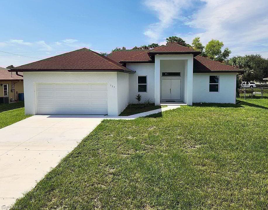 127 Connecticut Rd, Lehigh Acres, FL 33936-3