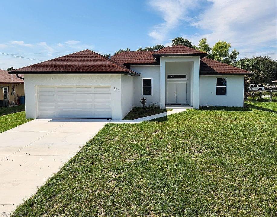 127 Connecticut Rd, Lehigh Acres, FL 33936-3