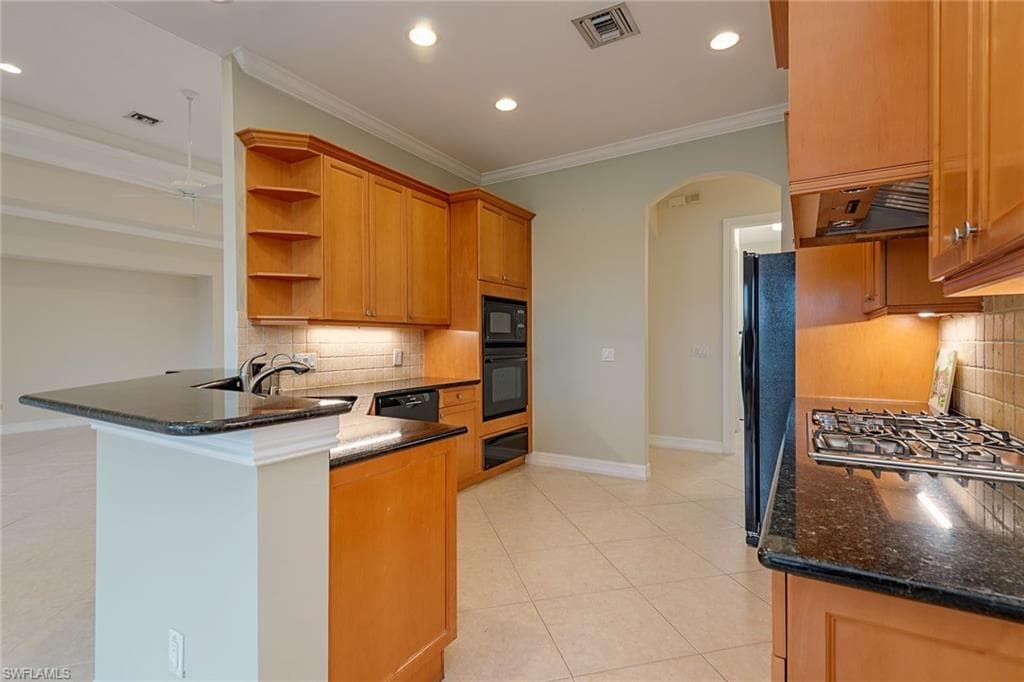 5031 Rustic Oaks Cir, Naples, FL 34105-8