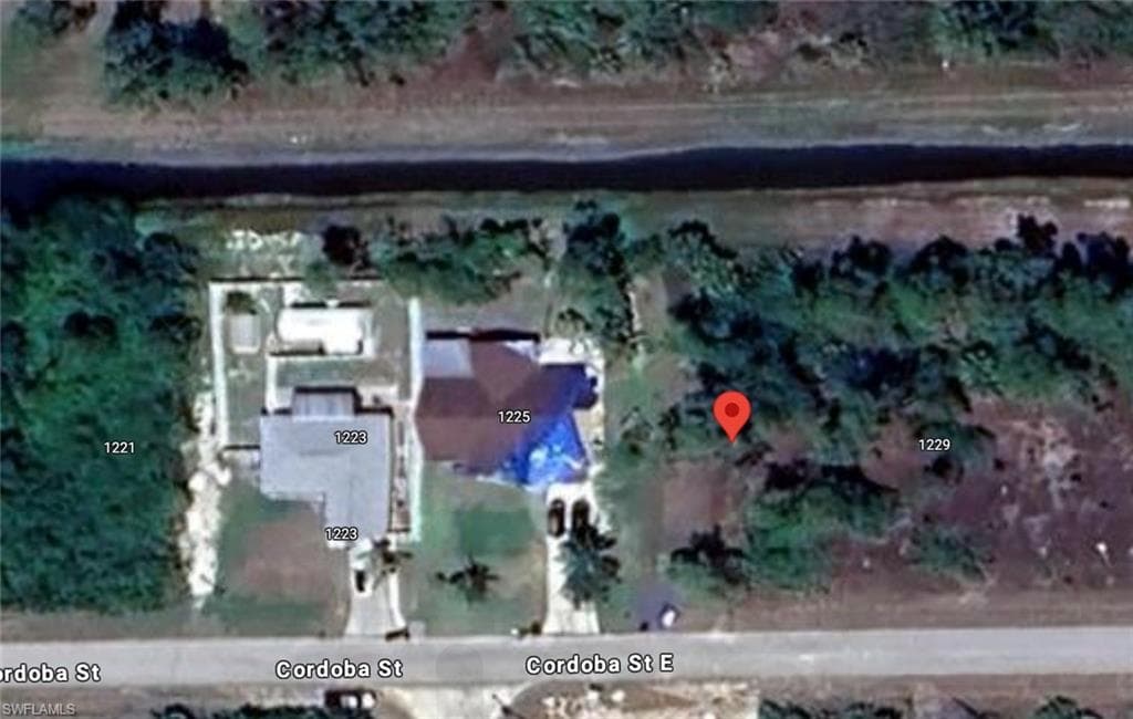 1227 Cordoba St E, Lehigh Acres, FL 33974-4