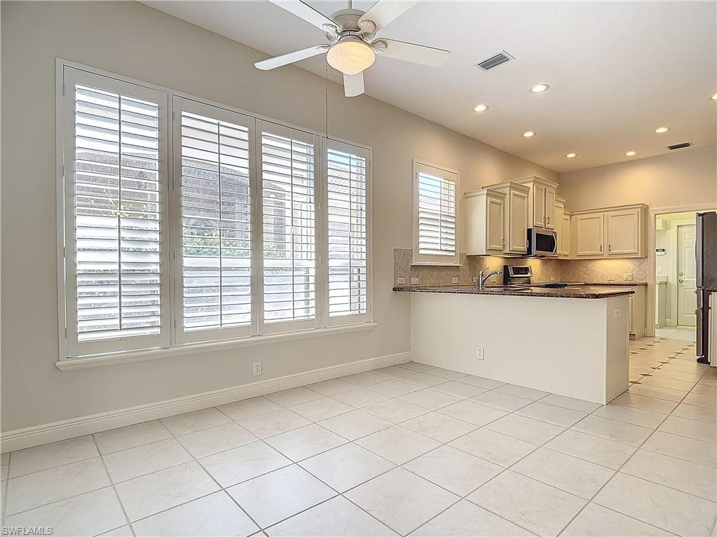 9190 Troon Lakes Dr, Naples, FL 34109-13