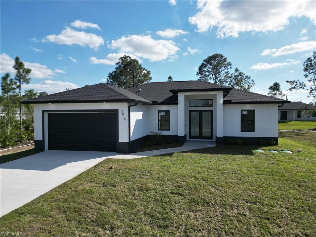 2815 32nd St W, Lehigh Acres, FL 33971-2