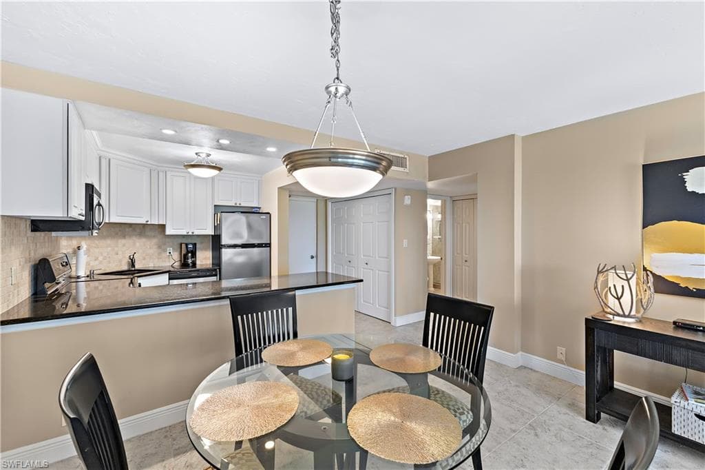 1 Bluebill Ave 409, Naples, FL 34108-9