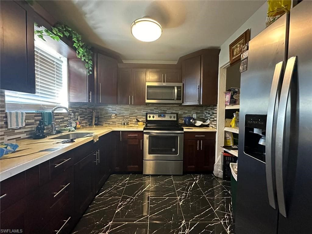1003 Joel Blvd, Lehigh Acres, FL 33936-1