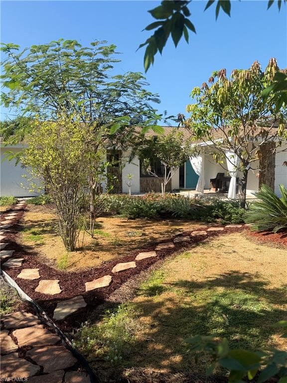 119 Flame Vine Dr, Naples, FL 34110-3