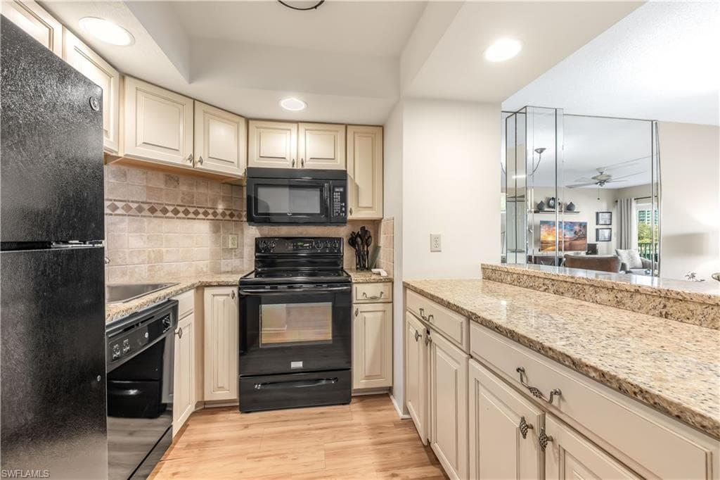 1 Bluebill Ave 201, Naples, FL 34108-4