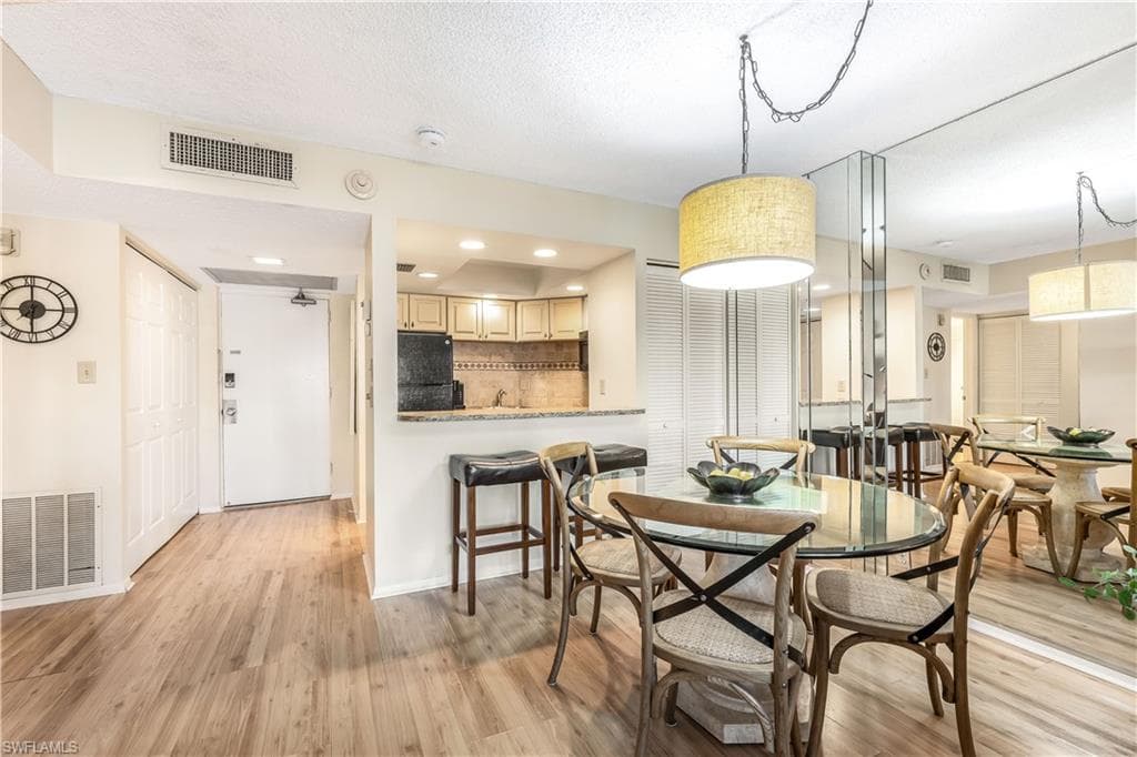 1 Bluebill Ave 201, Naples, FL 34108-5