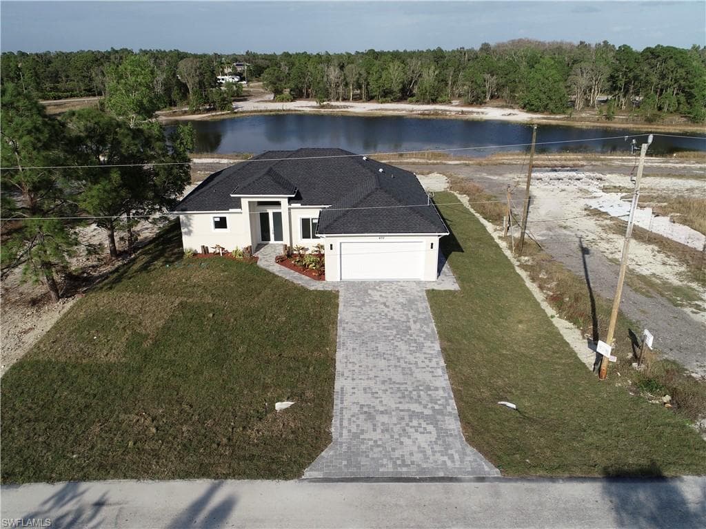 423 Harshaw St, Lehigh Acres, FL 33974-4
