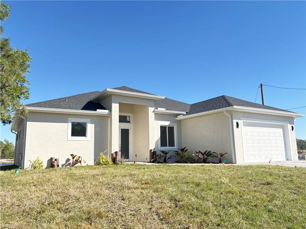 423 Harshaw St, Lehigh Acres, FL 33974-5