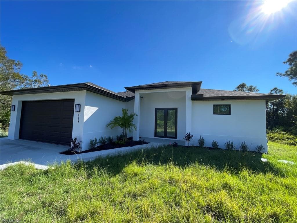 818 Chemstrand St E, Lehigh Acres, FL 33974-1
