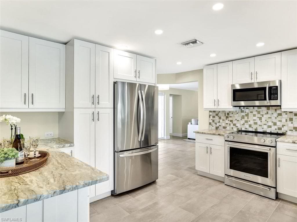 79 Burning Tree Dr, Naples, FL 34105-8