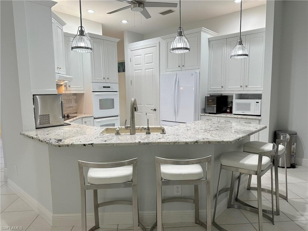 516 Eagle Creek Dr, Naples, FL 34113-7