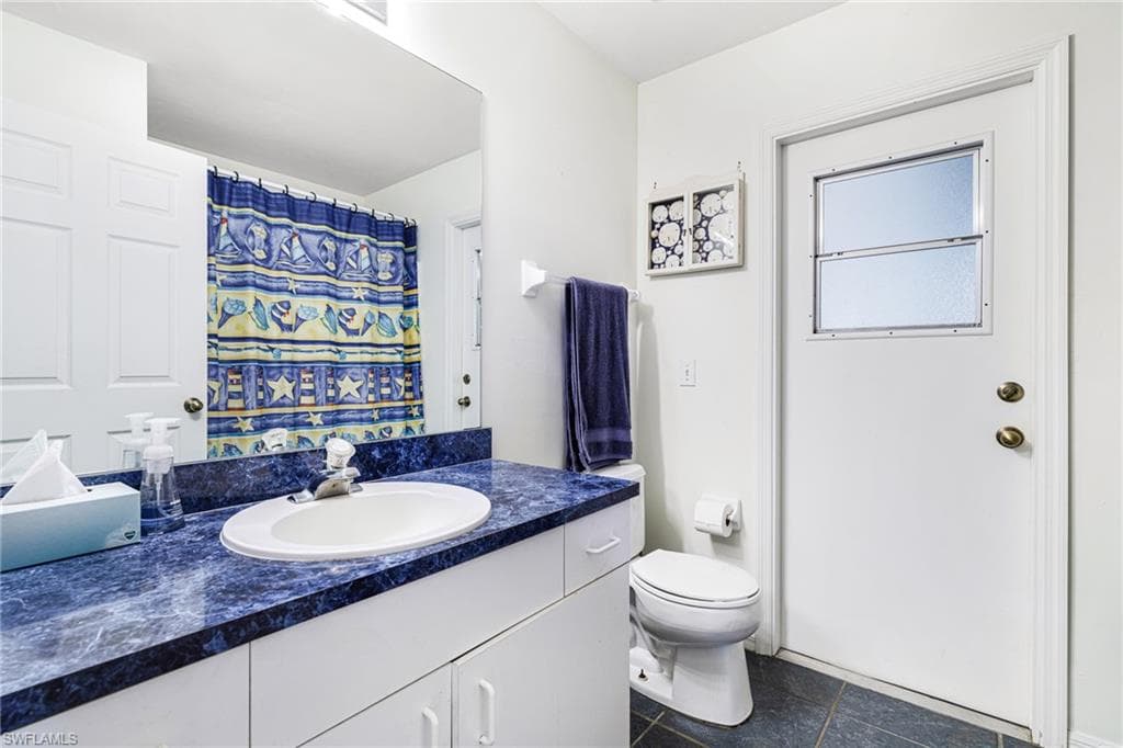 711 12th St NE, Naples, FL 34120-21
