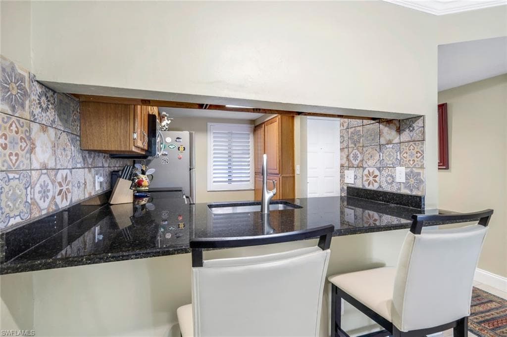 5857 Rattlesnake Hammock Rd 107, Naples, FL 34109-9
