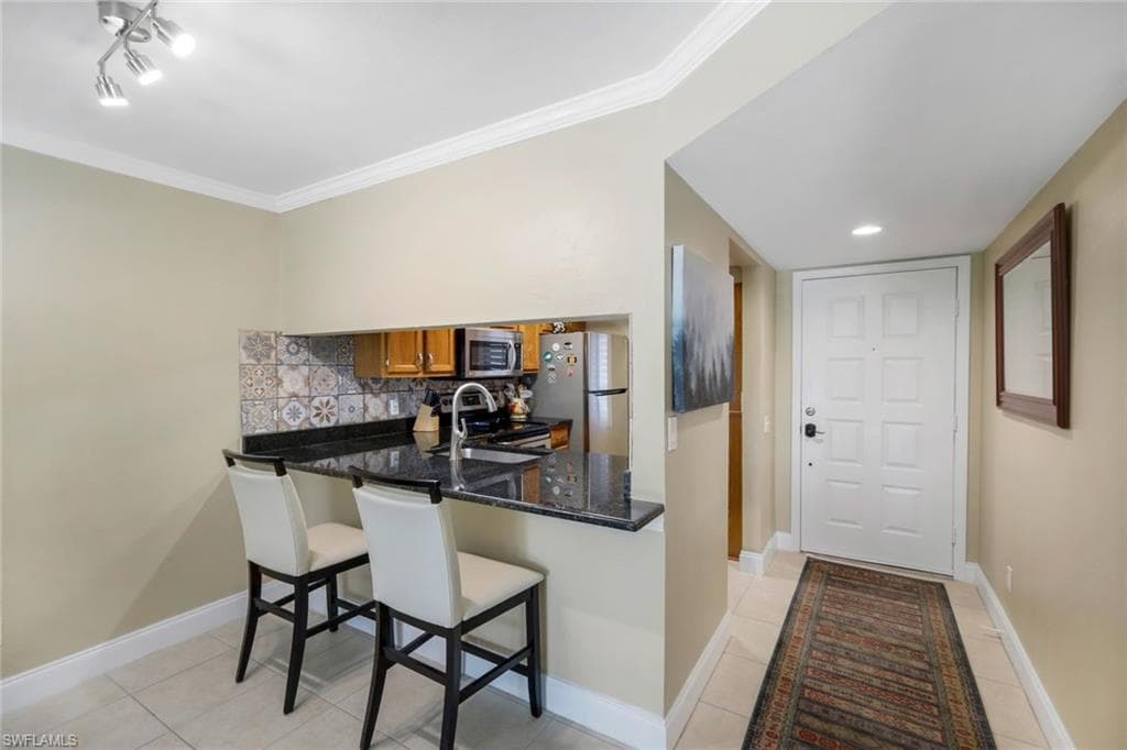 5857 Rattlesnake Hammock Rd 107, Naples, FL 34109-8