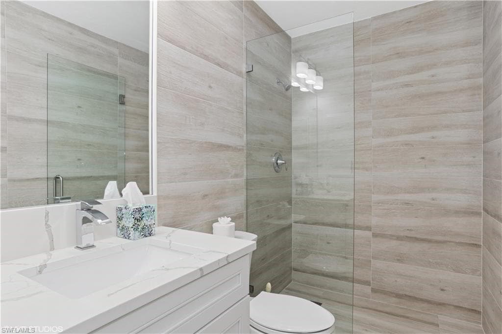 7048 Pelican Bay Blvd C-105, Naples, Fl 34108-15
