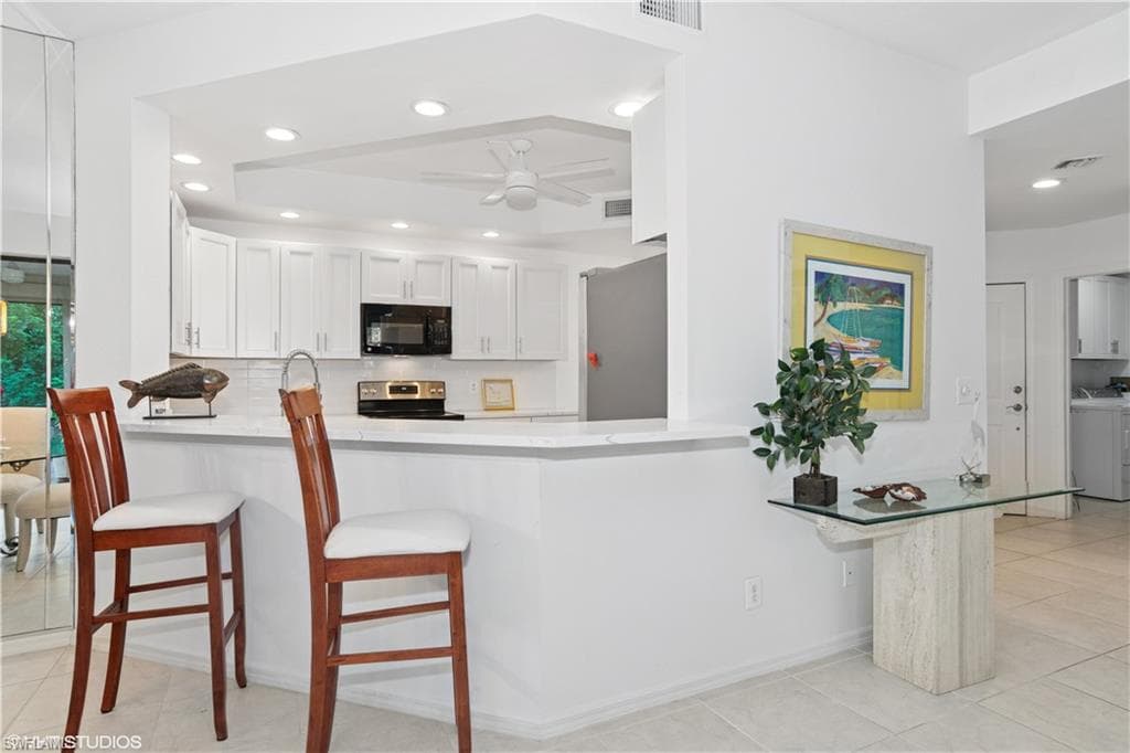 7048 Pelican Bay Blvd C-105, Naples, Fl 34108-7