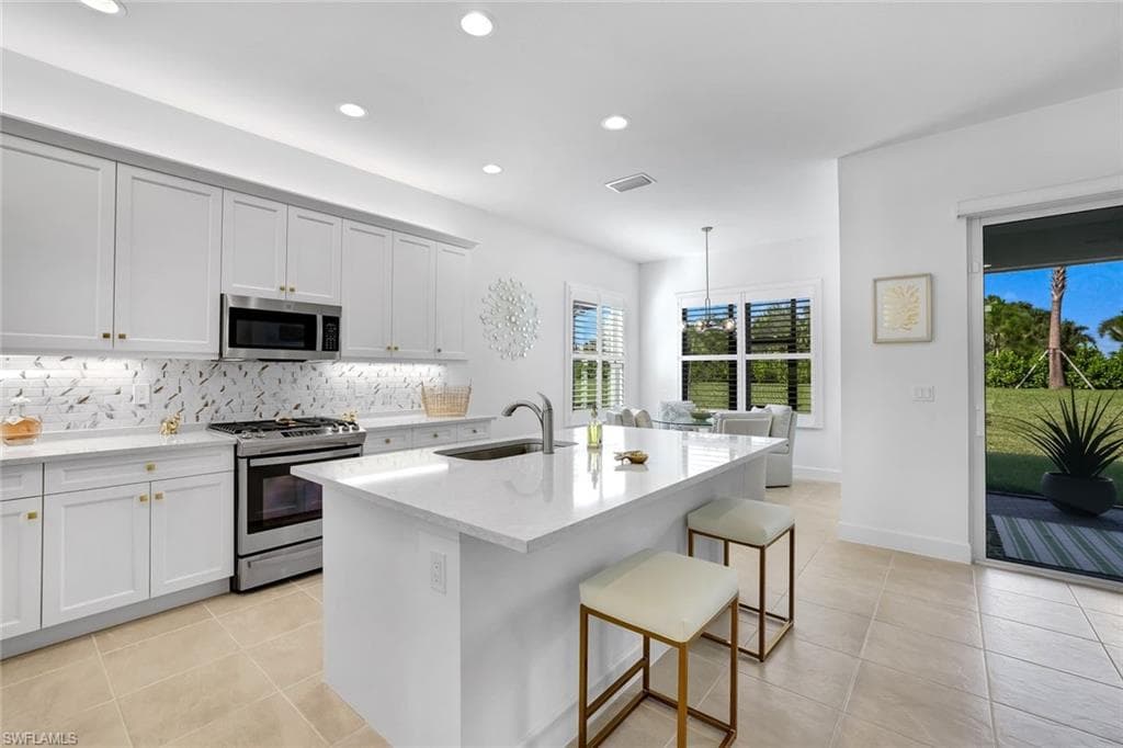 12349 Dahlia Ct, Naples, FL 34120-26