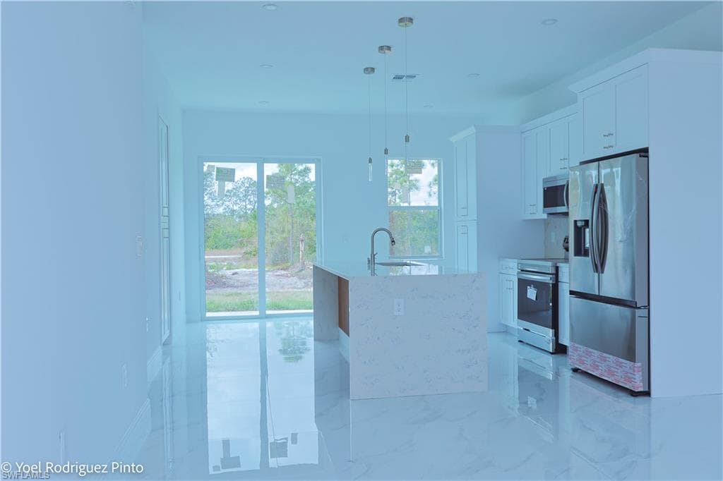 528 Aspen Ave S, Lehigh Acres, FL 33974-9