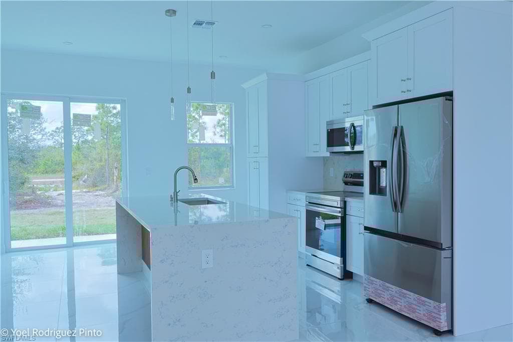 528 Aspen Ave S, Lehigh Acres, FL 33974-5