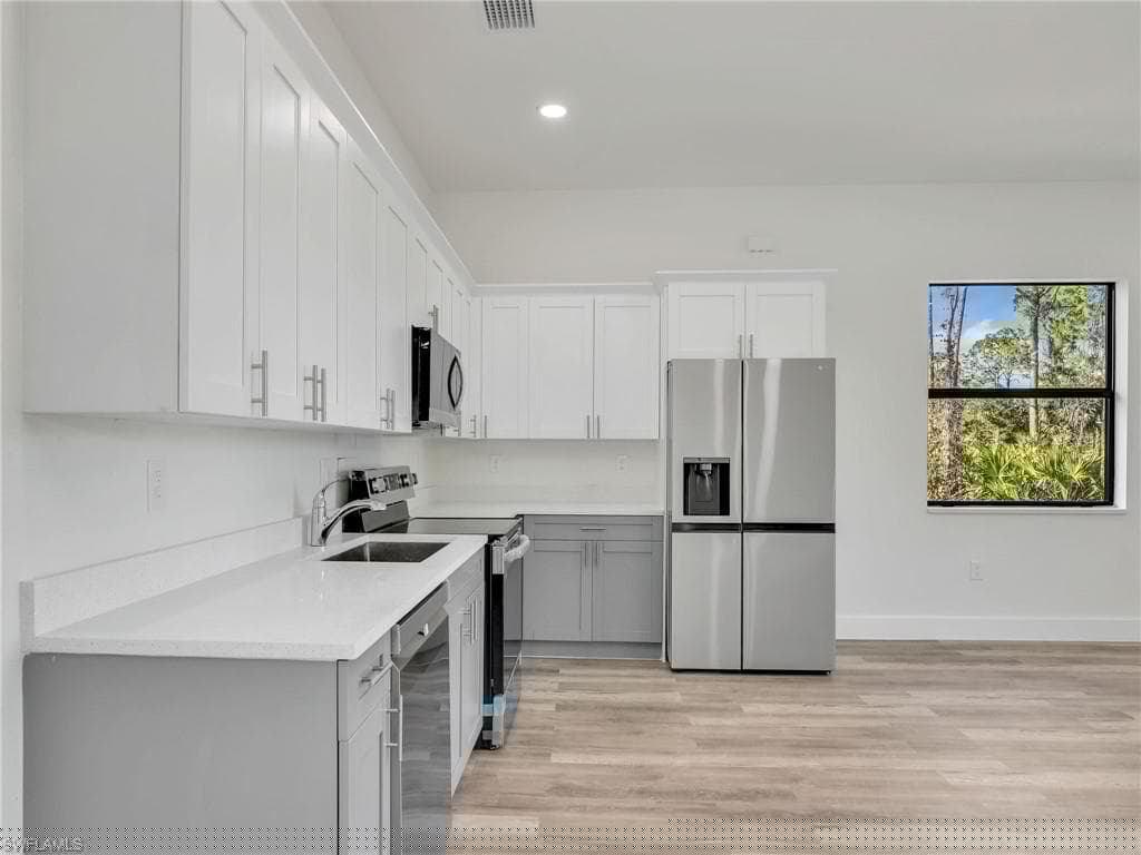 411 Eisenhower Blvd, Lehigh Acres, fl 33974-5