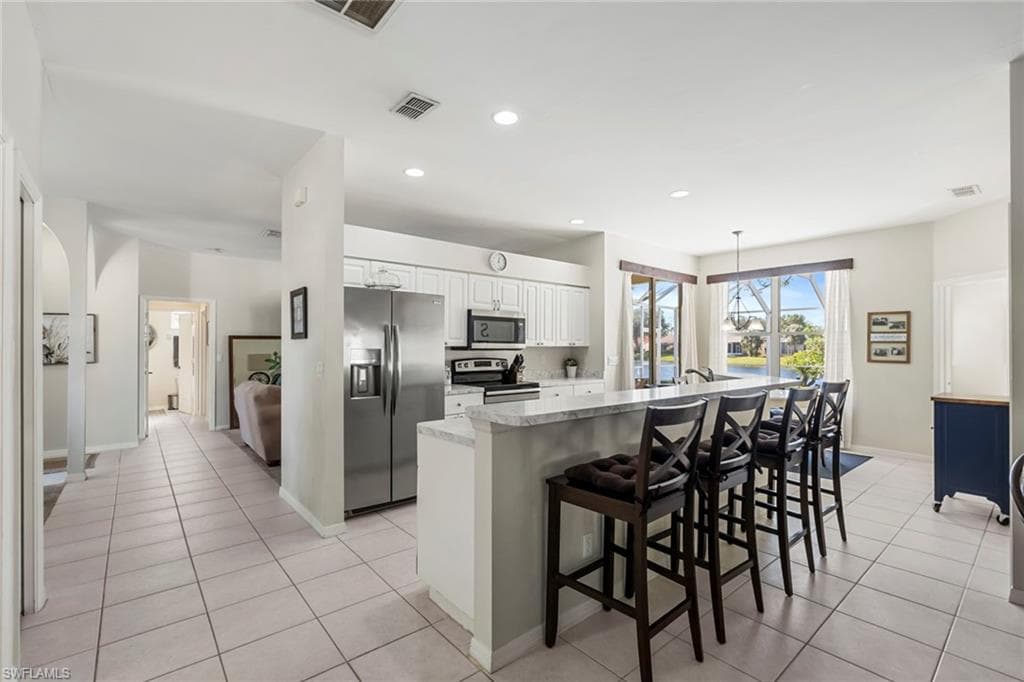 719 Teton Ct, Naples, FL 34104-5