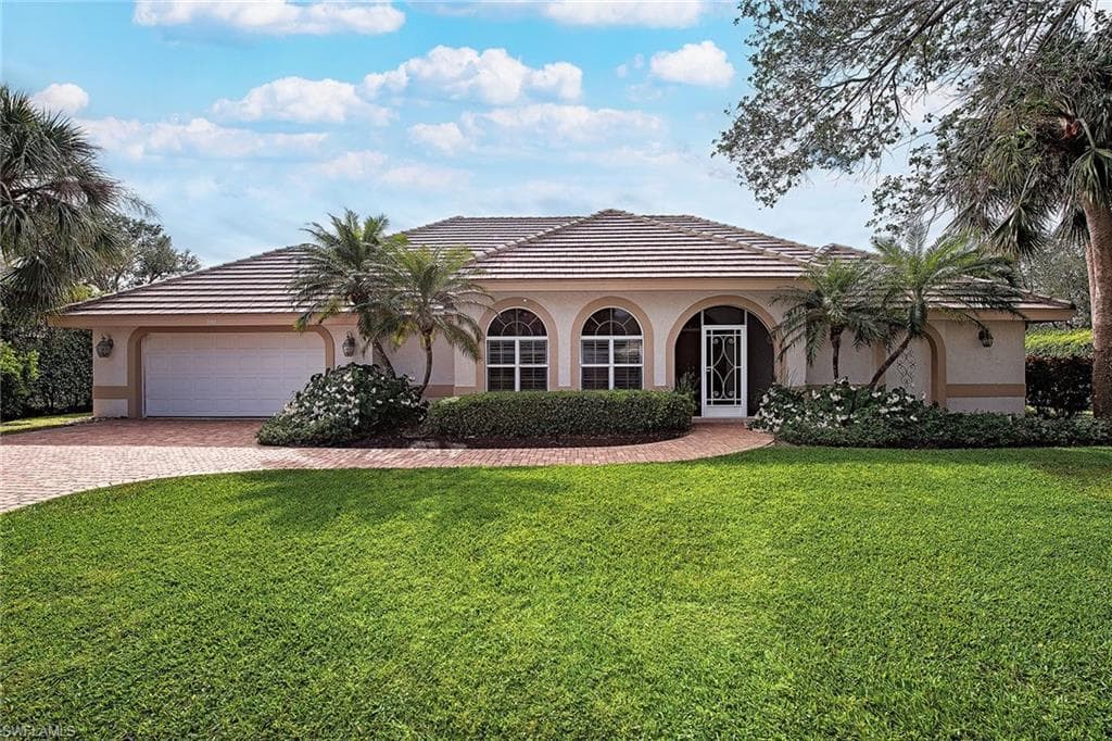 702 Willowwood Ln, Naples, FL 34108-2