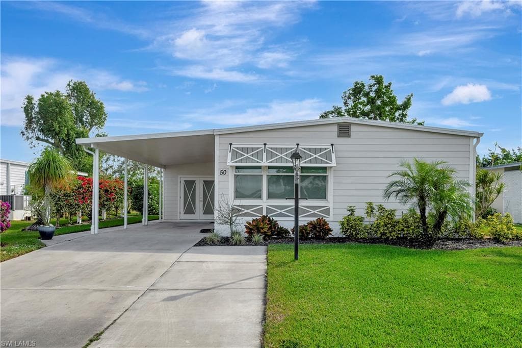 50 Le Mans Dr, Naples, FL 34112-1