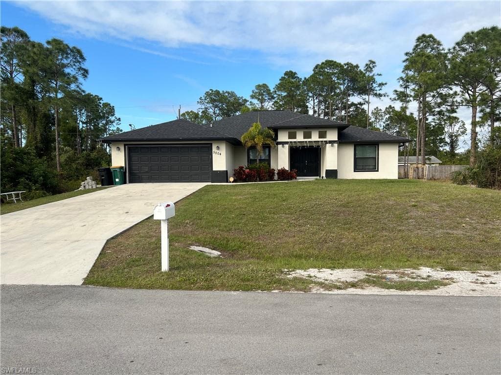5204 6th St W, Lehigh Acres, FL 33971-3