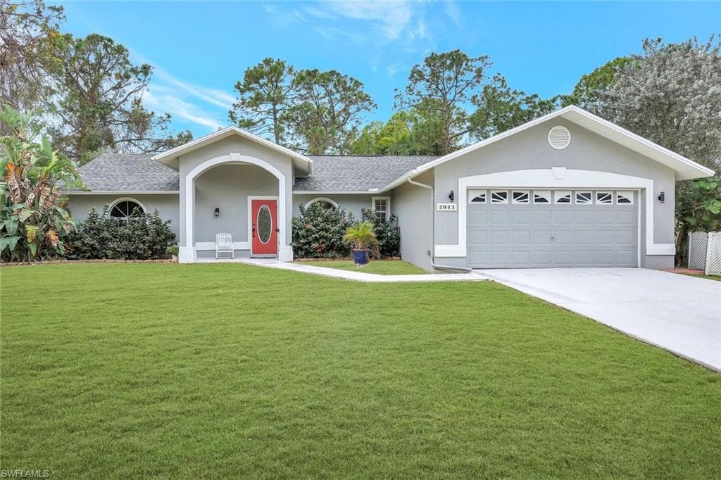 2911 16th St W, Lehigh Acres, FL 33971-2