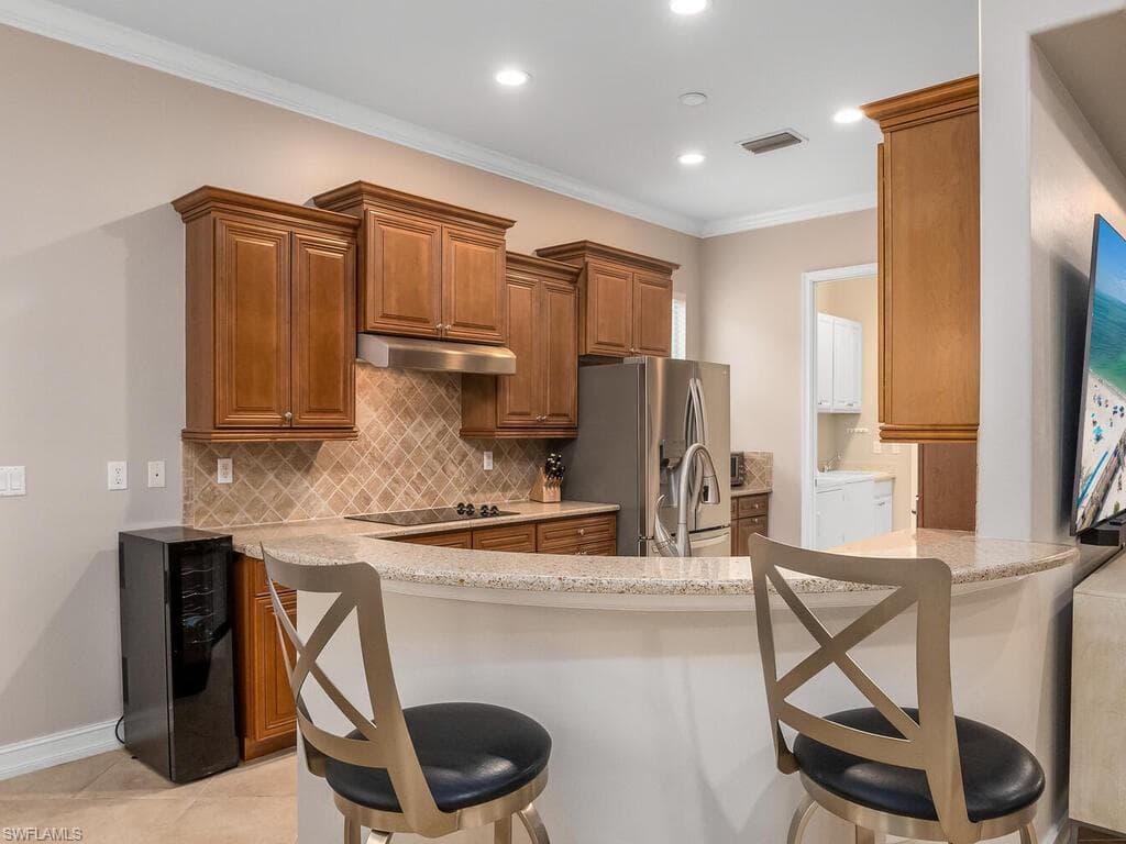 10212 Gator Bay Ct E, Naples, FL 34120-9